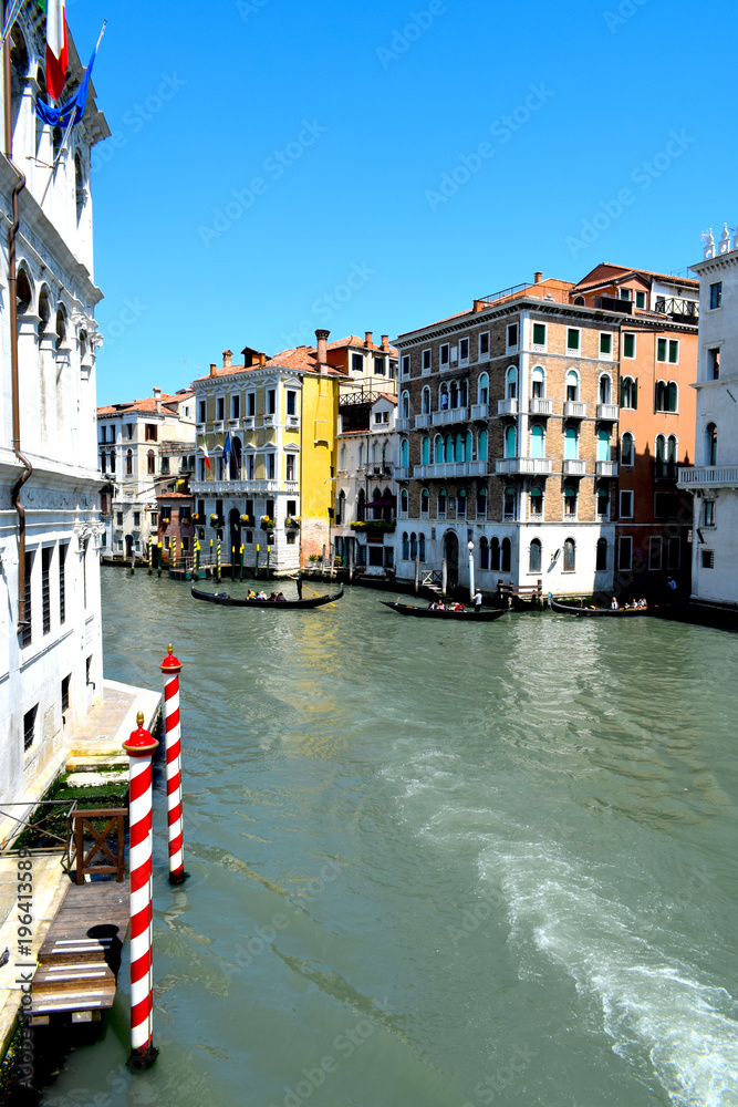 Fototapeta premium Architecture and Architectural Features in and around Venice, Italy including scenes on The Grand Canal, featuring gondolas.