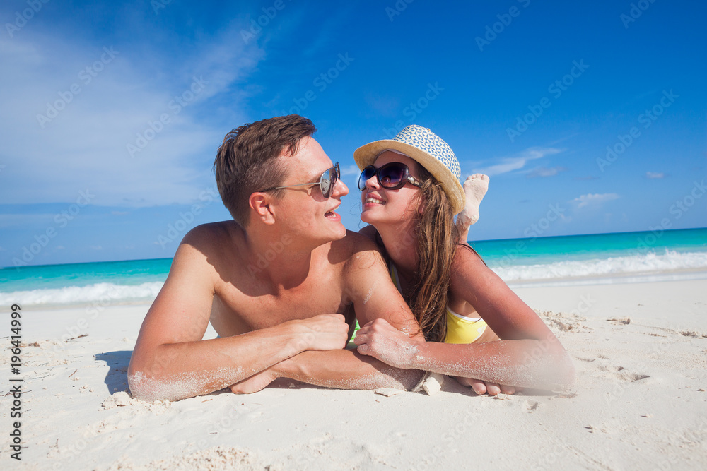 attractive couple enjoying sunny day at Cayo Largo beach, Cuba attractive couple enjoying sunny day at Cayo Largo beach, Cuba