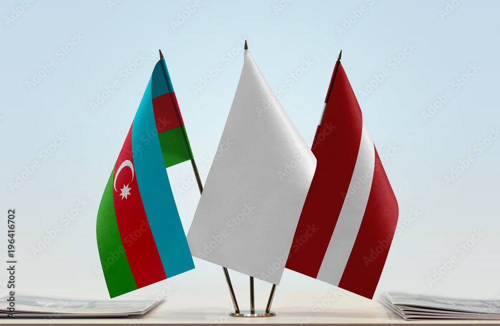 Flags of Azerbaijan and Latvia with a white flag in the middle