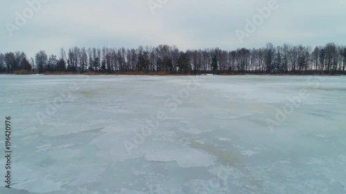 Wallpaper Mural Aeral drone footage. Flight to island on frozen lake Torontodigital.ca
