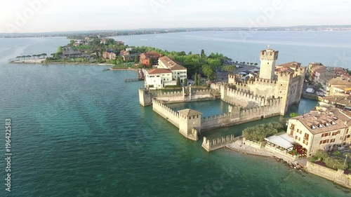 erial view. The Scaliger Castle in Sirmione. Lake Garda, Italy. 4K. photo