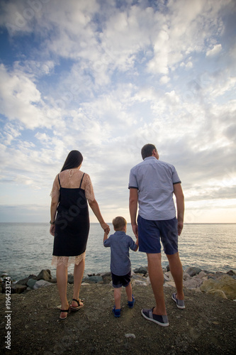 Family with child on the beach