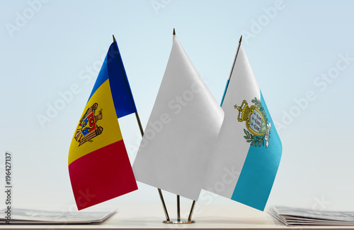 Flags of Moldova and San Marino with a white flag in the middle