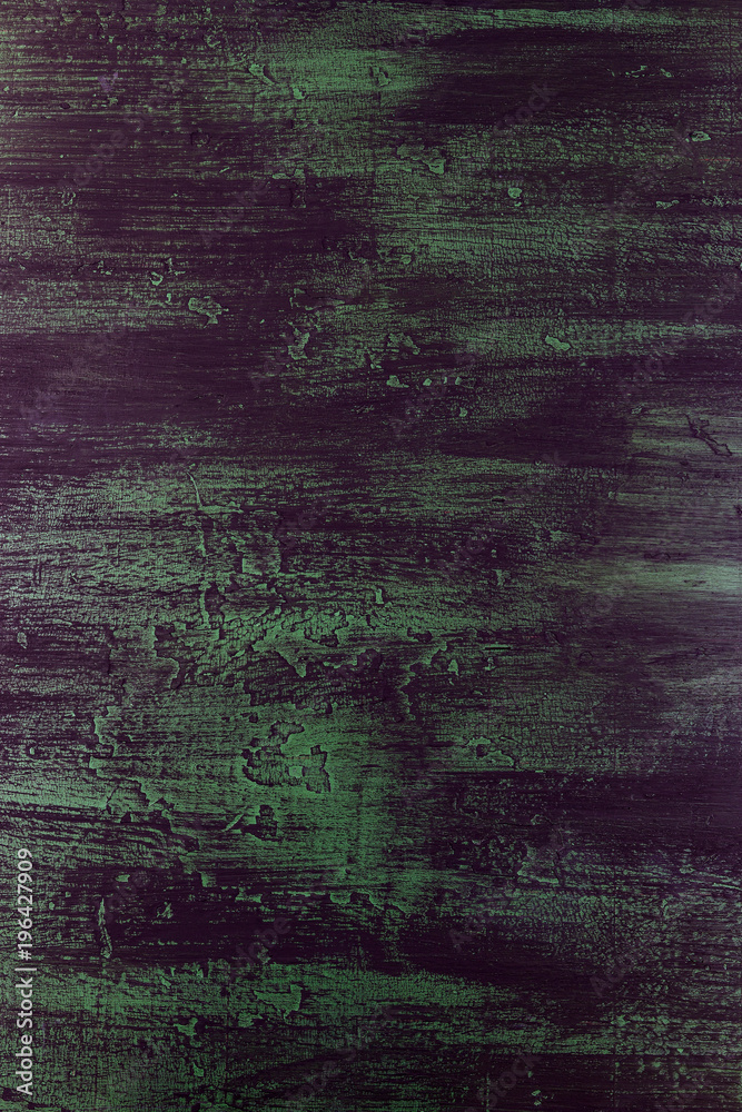Obraz premium brushstrokes with thick paint in shades of green, blue, purple on old wooden texture