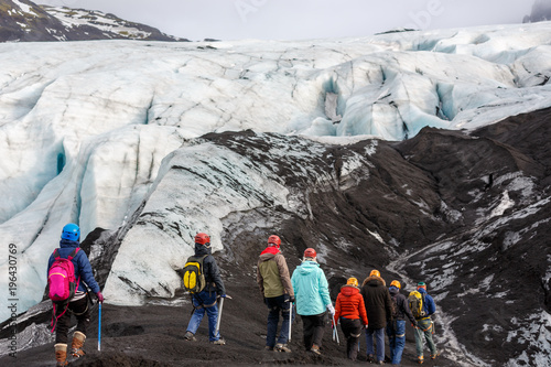 Group of hiker walk on glacier at Solheimajokull