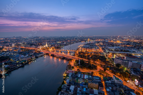 Sunset Scene with Phra Phuttha Yodfa Bridge, Memorial Bridge and Chao Praya River in Bangkok © aee_werawan