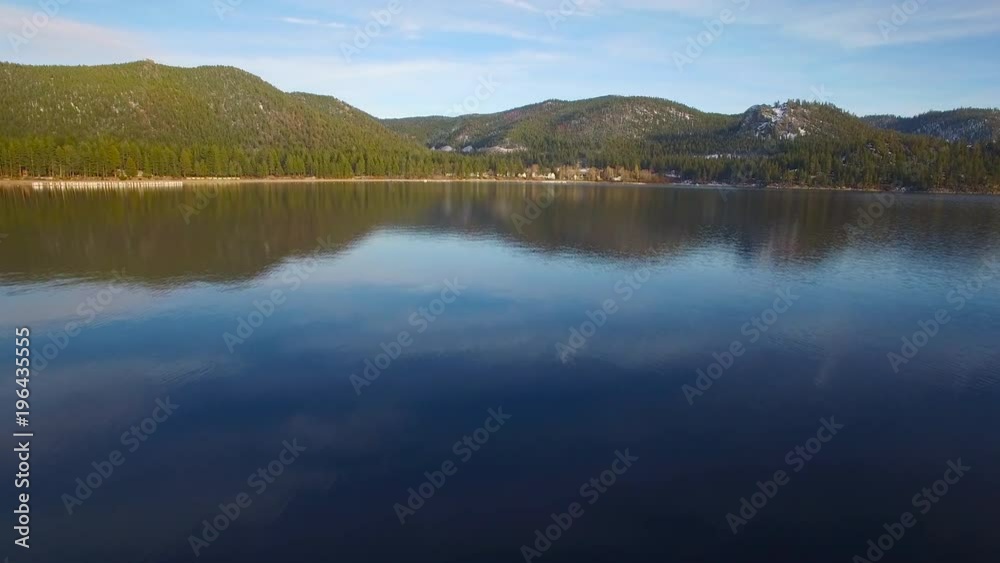 An aerial shot over Lake Tahoe approaching the shore. An aerial shot over Lake Tahoe approaching the shore.