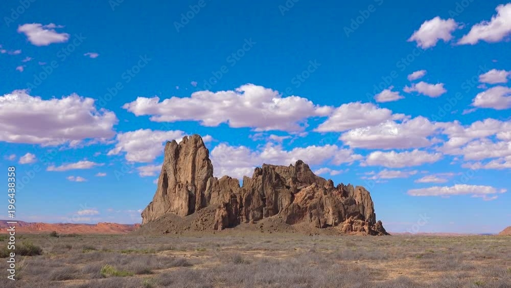 A beautiful time lapse behind a rock formation near Monument Valley.