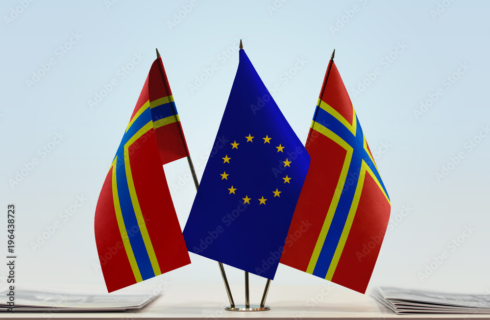 Two flags of Orkney and European Union flag between