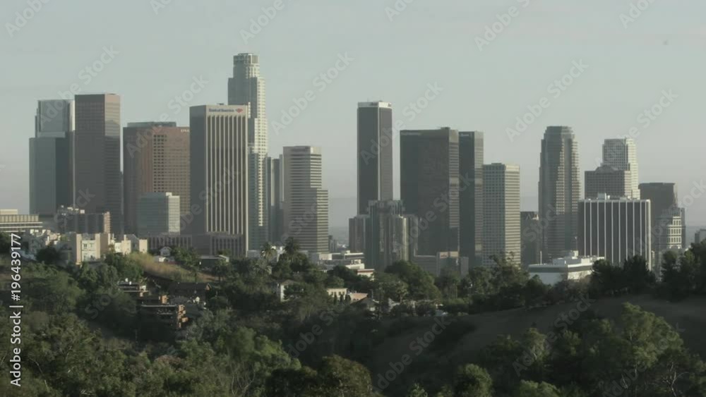 Shadows form on skyscrapers as the sun passes over Los Angeles. Shadows form on skyscrapers as the sun passes over Los Angeles.