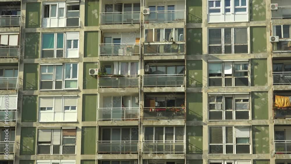 Establishing shot of an old rundown high rise apartment building. Establishing shot of an old rundown high rise apartment building.