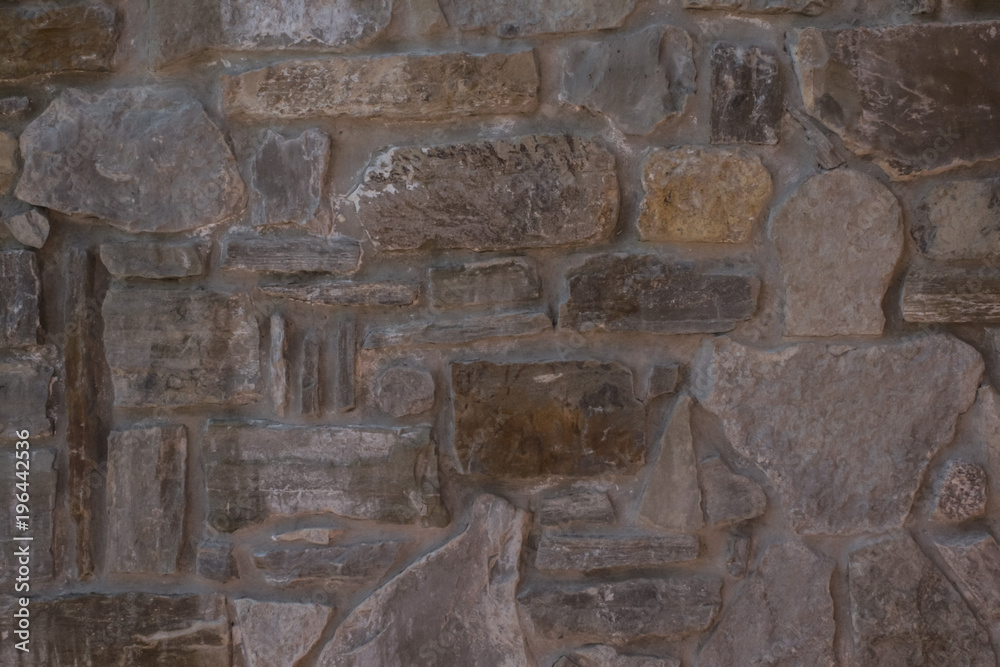 architectural design pattern on a stone wall architectural design pattern on a stone wall