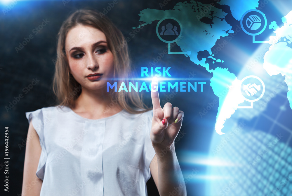 The concept of business, technology, the Internet and the network. A young entrepreneur working on a virtual screen of the future and sees the inscription: Risk management The concept of business, technology, the Internet and the network. A young entrepreneur working on a virtual screen of the future and sees the inscription: Risk management