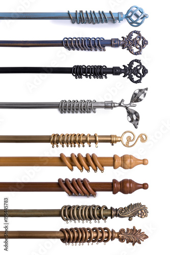 Close Up Of Various Curtain Rods In Different Materials & Colors Isolated On White Background