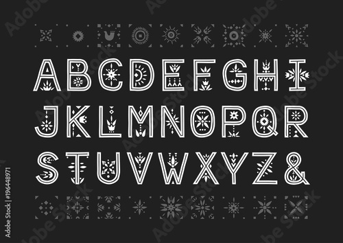 Vector capital alphabet. Decorative letters with patternded negative space. photo