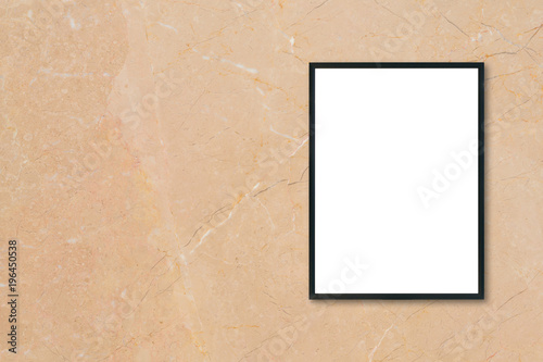 Mock up blank poster picture frame hanging on brown marble wall background in room - can be used mockup for montage products display and design key visual layout.