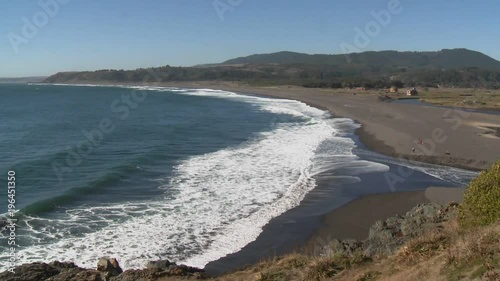 The Pacific coast near Buchupureo, a popular surf beach in Chile photo