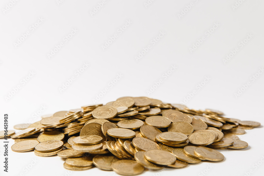 Close up of big pile of golden coins isolated on white background. Concept of money business growth gain success earnings. Copy space for advertisement. With place for text. Close up of big pile of golden coins isolated on white background. Concept of money business growth gain success earnings. Copy space for advertisement. With place for text.