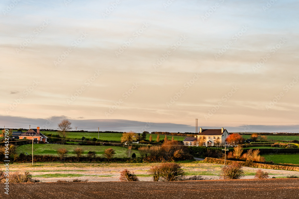 Scenic view of Irish farmland at sunset Scenic view of Irish farmland at sunset