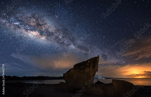 Seascape with Milkyway galaxy. image contain soft focus and noise due to long expose and high iso.