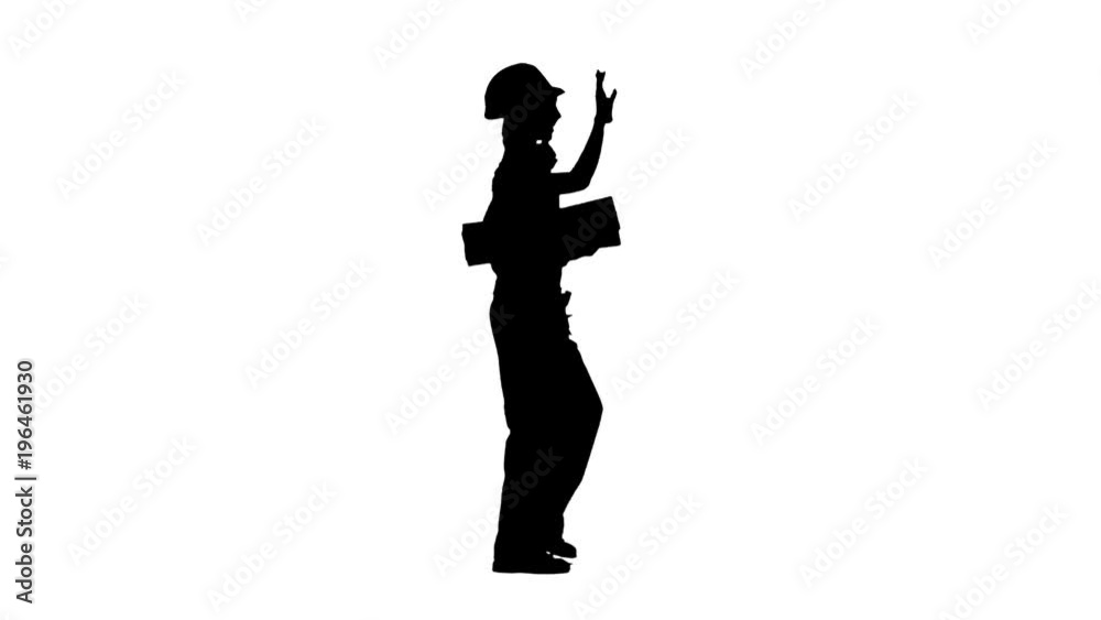 Construction worker wearing a helmet carries three wooden boards. Silhouette. White background. Side view Construction worker wearing a helmet carries three wooden boards. Silhouette. White background. Side view
