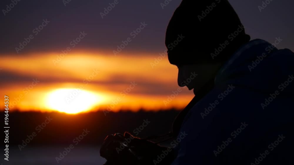 Silhouette of man photographer in sunset Silhouette of man photographer in sunset