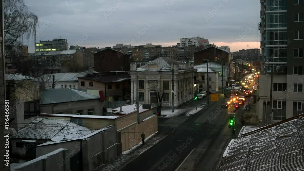 Cars moving in the city centre of Kharkiv, Ukraine late in the evening, timelapse