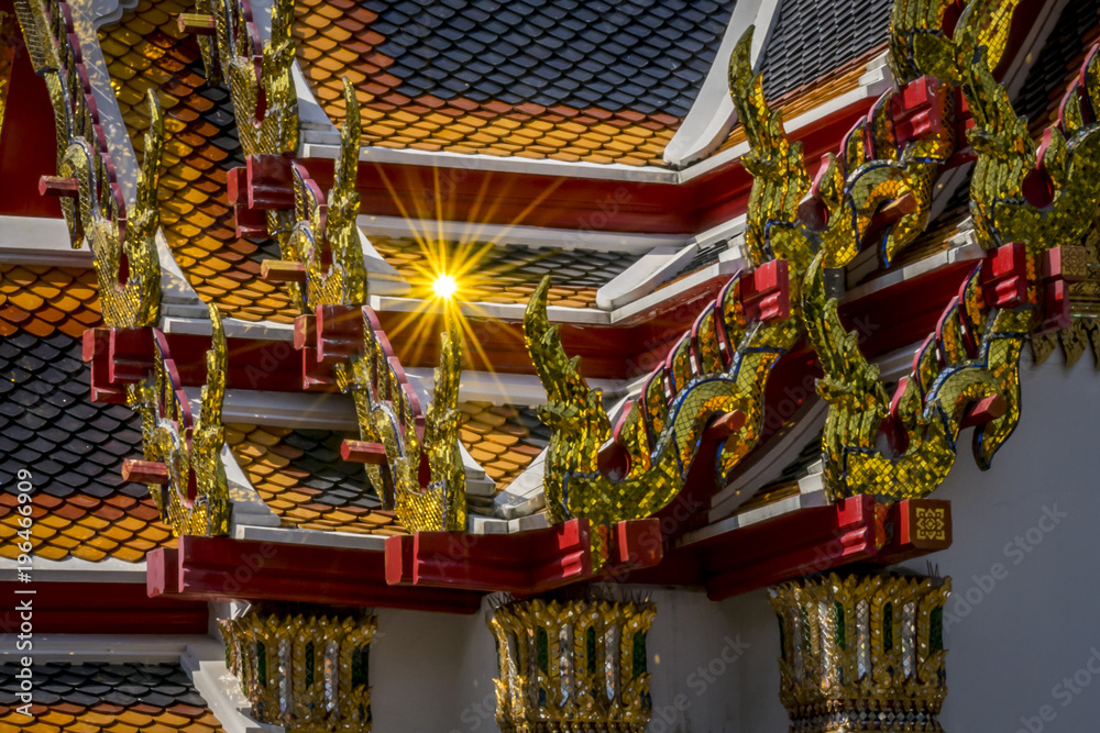 Church roof at Wat Pho, Thailand . Architectural detail of the ornate roof.