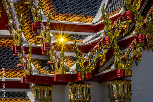 Church roof at Wat Pho, Thailand . Architectural detail of the ornate roof.