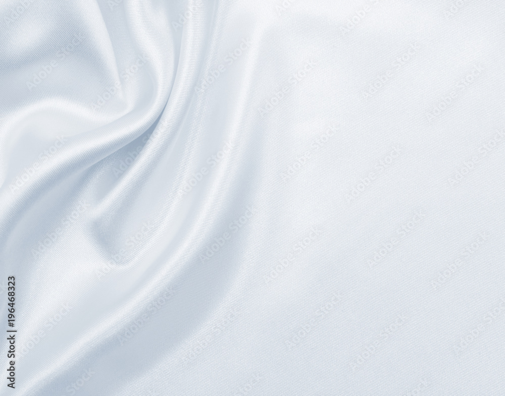 Smooth elegant grey silk or satin luxury cloth as wedding background. Luxurious Christmas background or New Year background design Smooth elegant grey silk or satin luxury cloth as wedding background. Luxurious Christmas background or New Year background design