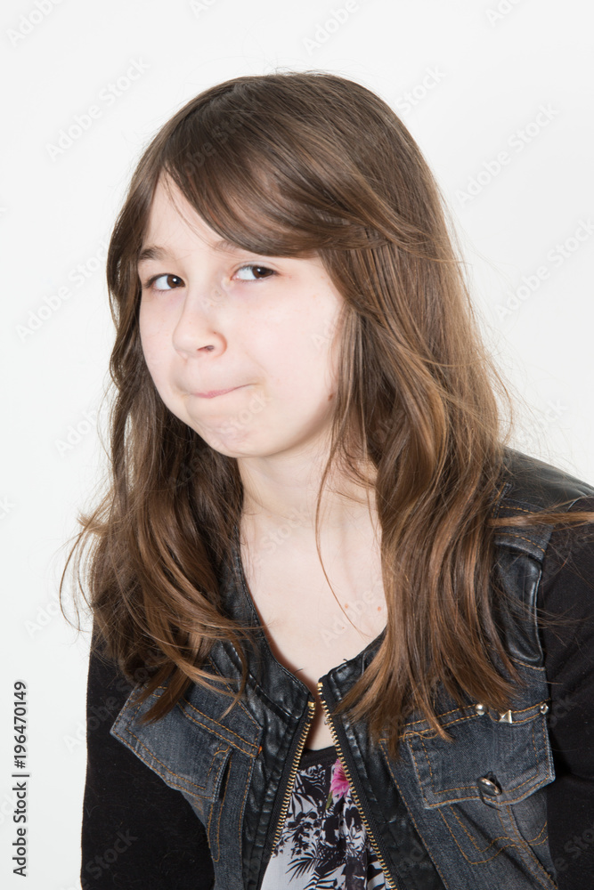 Portrait of a timid cute little girl isolated on white background Portrait of a timid cute little girl isolated on white background