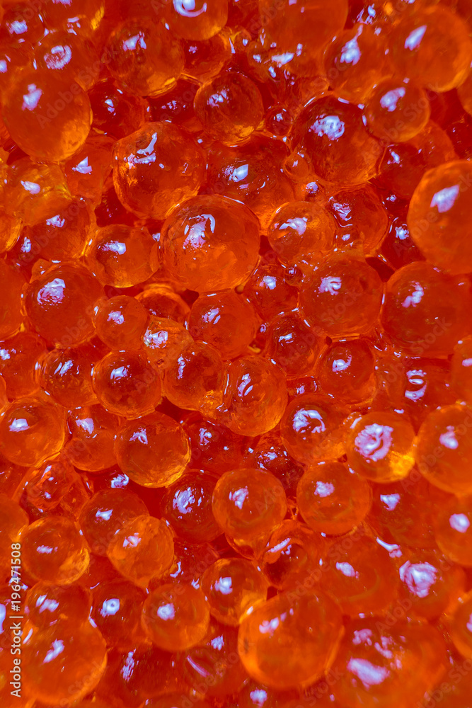 Caviar red parody fish close up. Background of red caviar. Caviar red parody fish close up. Background of red caviar.