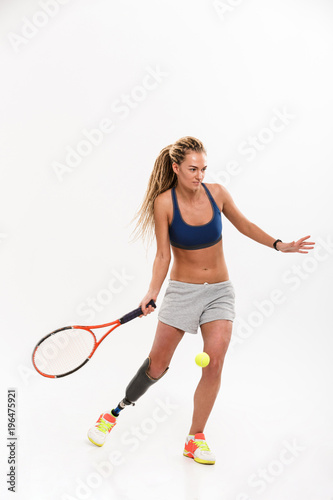 Full length portrait of a motivated young disabled sportswoman © Drobot Dean
