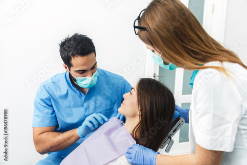 Dentist doctor starts wot watch woman patient