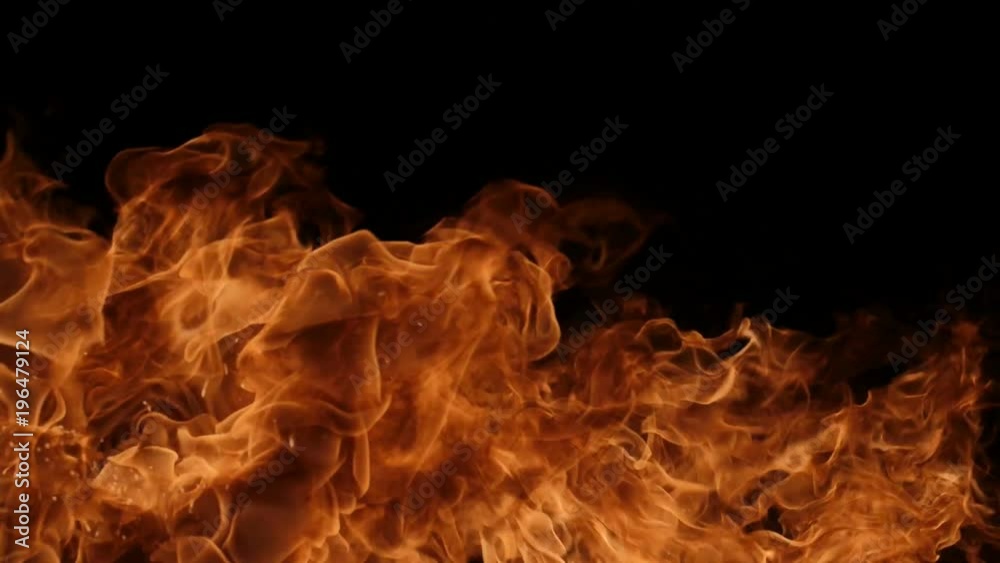 Slow motion of realistic fire blast on black background