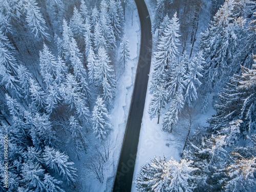 Aerial view of a road through winter landscape, Gaisberg, Salzburg, Austria photo