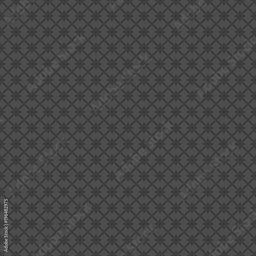 Classical geometrical pattern, black elements on dark grey background.