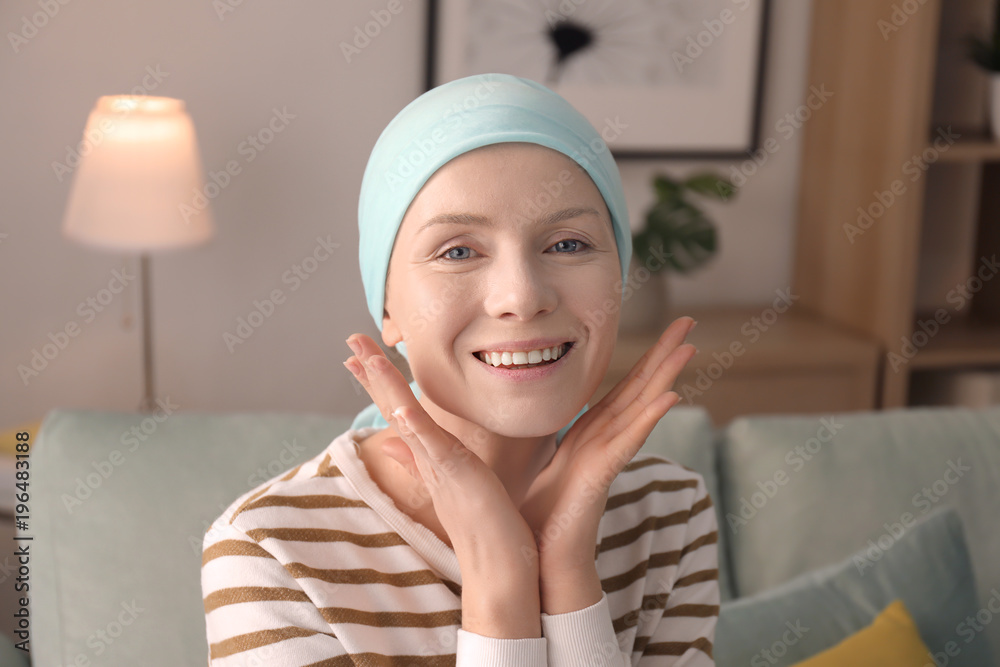 Young woman with cancer in headscarf indoors Young woman with cancer in headscarf indoors
