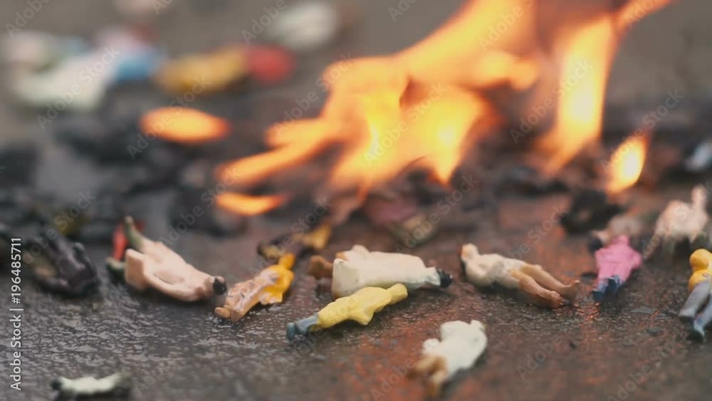 Burning people. Models of people are burning. The concept of aggression, ecology, danger. Slow motion. Burning people. Models of people are burning. The concept of aggression, ecology, danger. Slow motion.