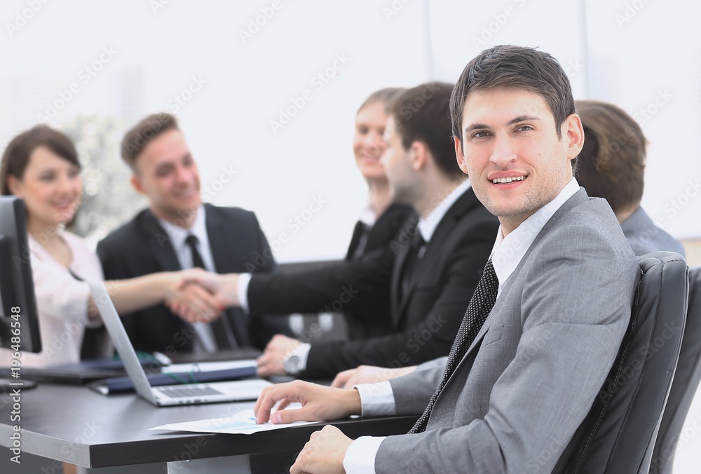 lawyer on the background of business partners handshaking lawyer on the background of business partners handshaking
