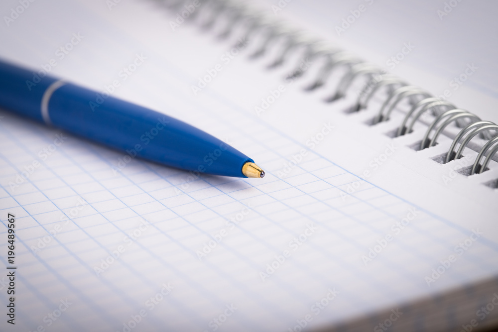 Blue Handle On Open Spira Sheet Notebook Close Up. Blue Handle On Open Spira Sheet Notebook Close Up.