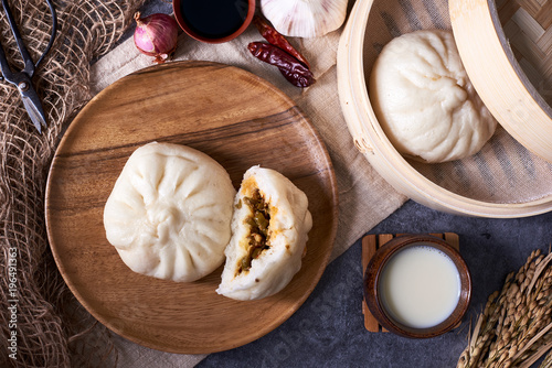 Chinese breakfast: Steamed buns (Baozi), fried breadsticks (yout photo