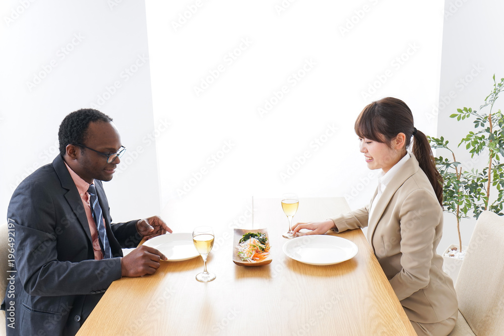 Businesspersons enjoying meal Businesspersons enjoying meal