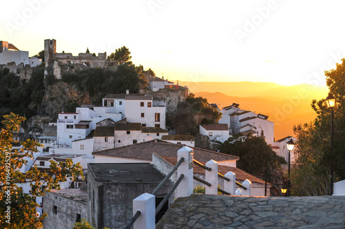 the road to the old city which is the mountain to the sunset photo