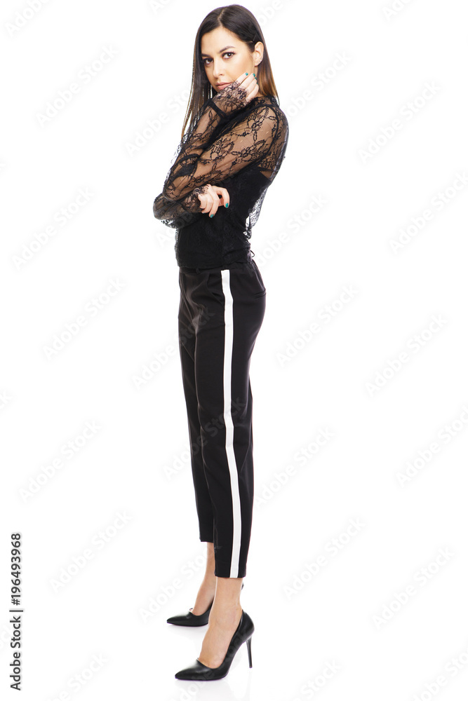 Fototapeta premium Full length portrait of a glamour fashion style woman on white background.