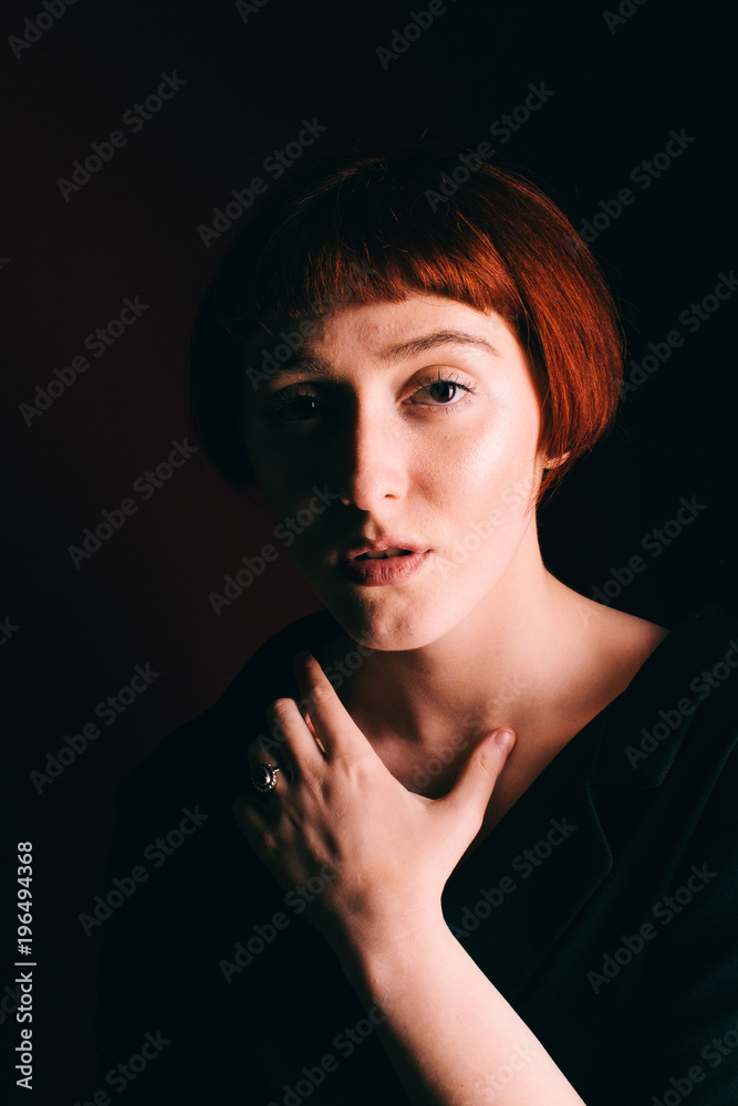 Beautiful girl freak with red hair and a short haircut Beautiful girl freak with red hair and a short haircut