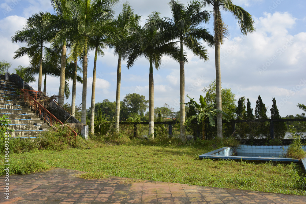 Fototapeta premium A stadium and pool in an abandoned park in south east asia
