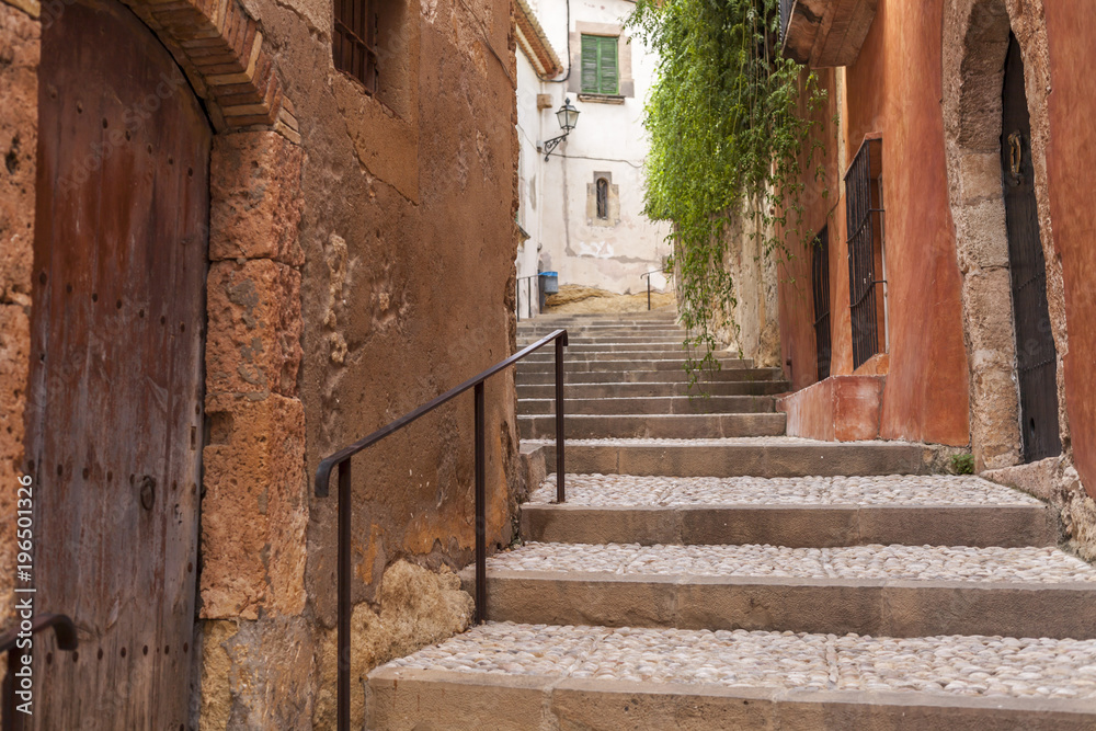 Street and colored houses in Altaulla, maritime village of Costa Daurada, province Tarragona, Catalonia.Spain. Street and colored houses in Altaulla, maritime village of Costa Daurada, province Tarragona, Catalonia.Spain.