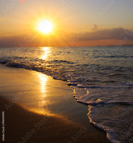Beautiful sunrise on the Greek beach.
