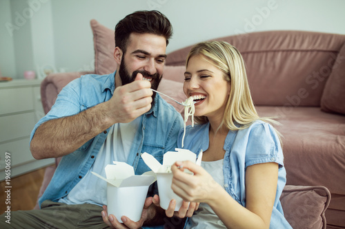 Couple eating spaghetti